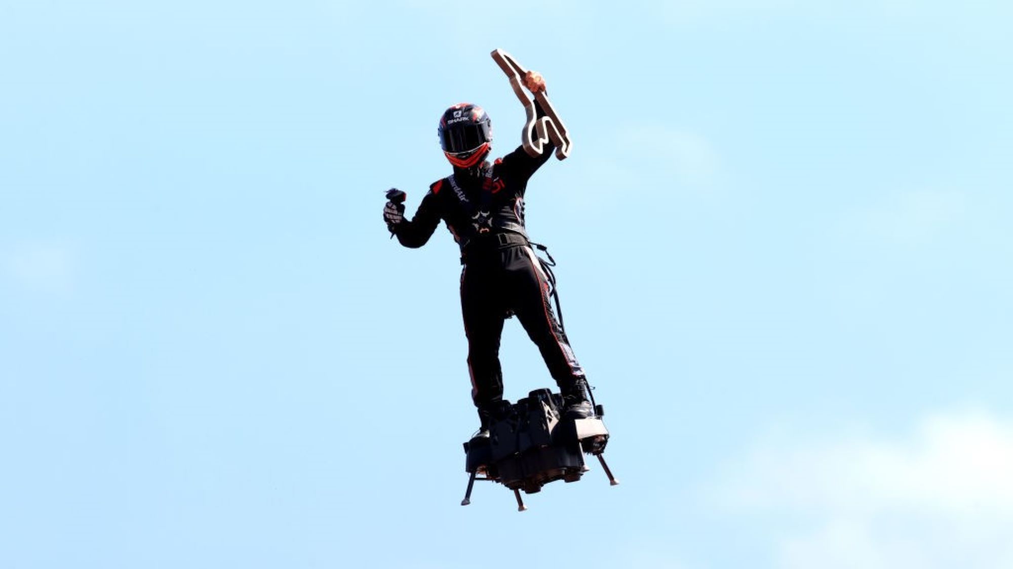 A performer on a hoverboard at the Formula !1 Belgian Grand Prix.