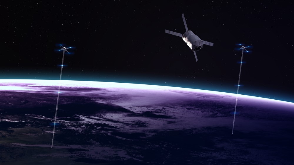 Space elevator models against a backdrop of Earth and space.