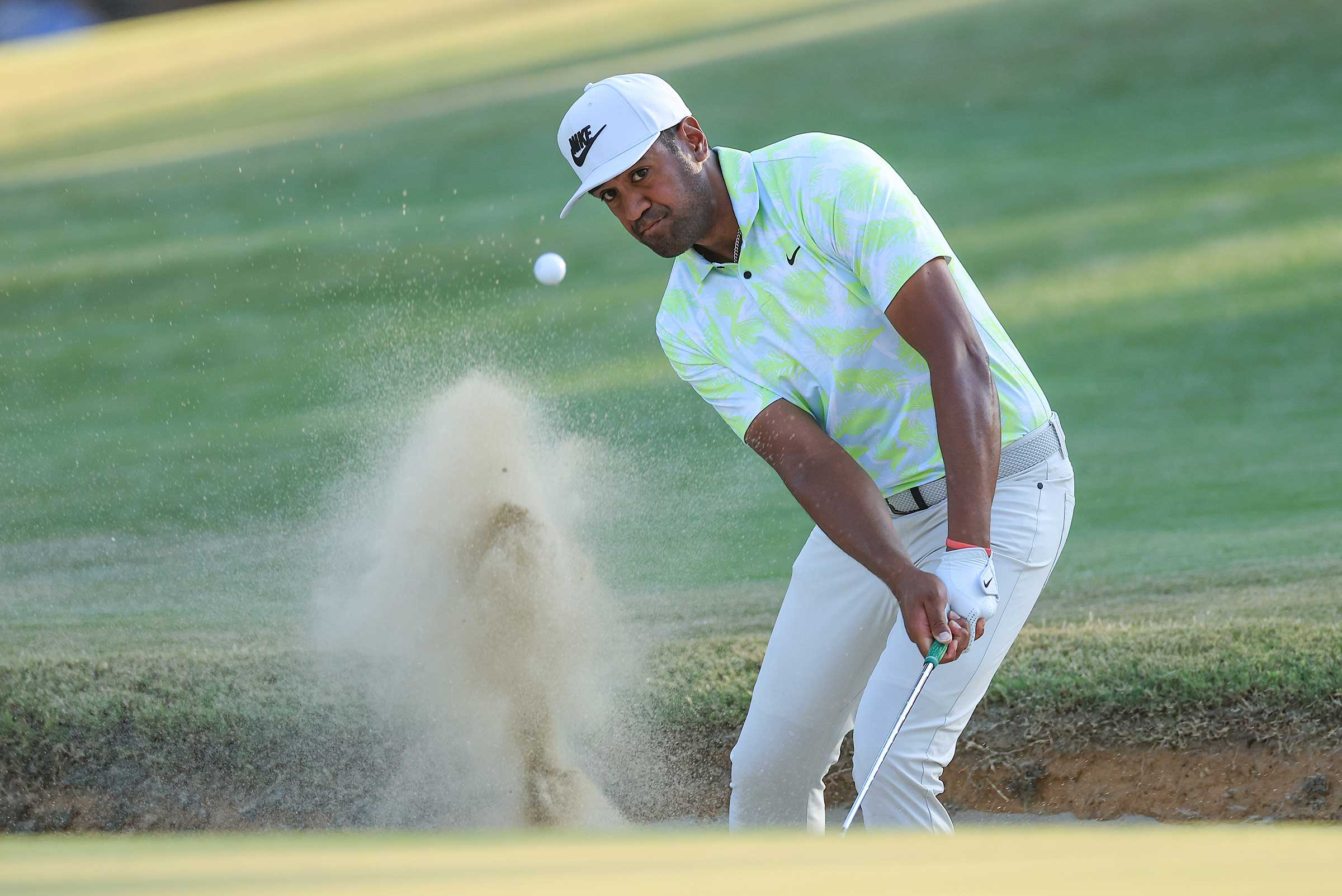 tony finau hits out of a bunker at the us open