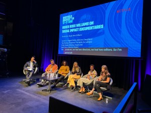 Roger Ross Williams (left) moderates a discussion on Social Impact Documentaries