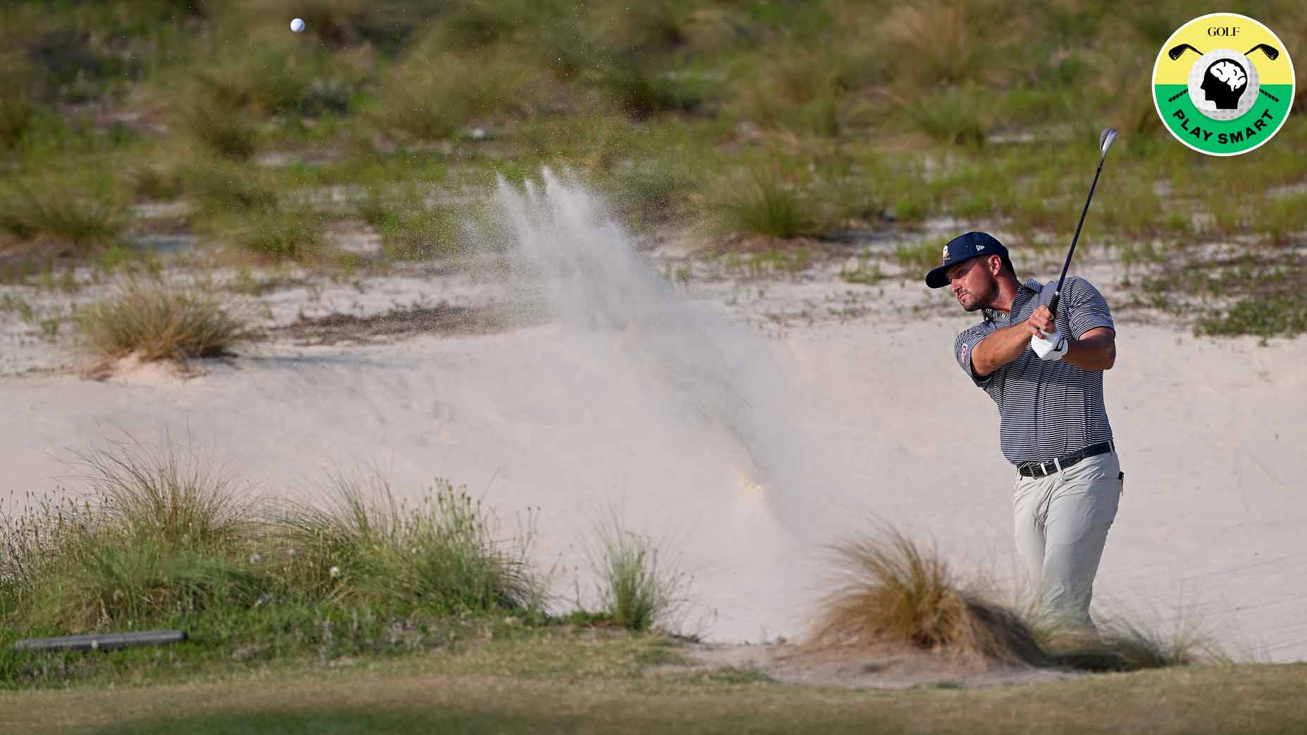 bryson dechambeau hits bunker shot on the 18th hole at pinehurst no. 2