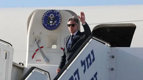 Reuters US Secretary of State Antony Blinken waves as he arrives at Tel Aviv Ben Gurion airport in Israel (10 June 2024)