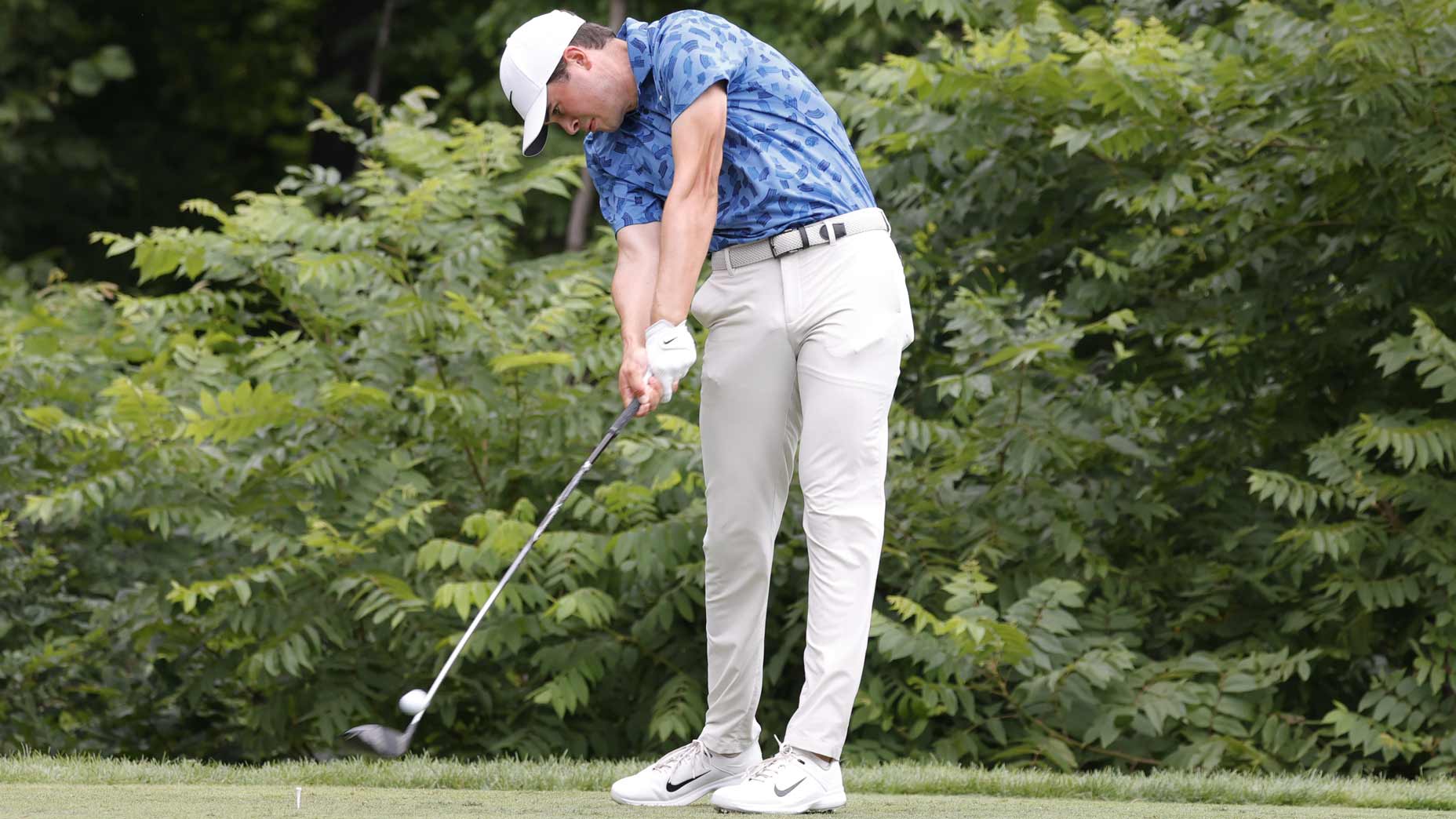 Davis Thompson plays his tee shot at the John Deere Classic.