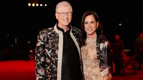 Reuters Bill Gates and Paula Hurd pose during the pre-wedding celebrations of Anant Ambani