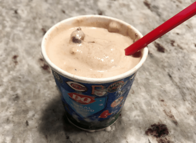 cookie dough blizzard from DQ on a countertop 