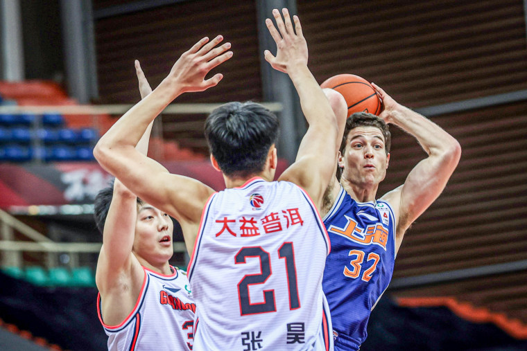 Jimmer Fredette passes the ball