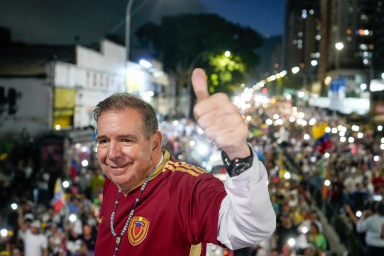 Opposition presidential candidate Edmundo Gonzalez flashes a thumbs up during a rally launching the official presidential campaign