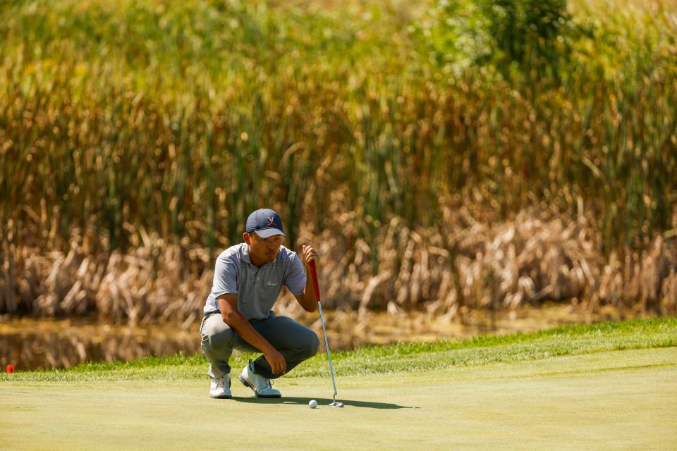 Paul Chang lines up his putt on the 14th hole during the first round of stroke play of the 2024 U.S. Amateur at Chaska Town Course in Chaska, Minn. on Monday, Aug. 12, 2024. (Chris Keane/USGA)