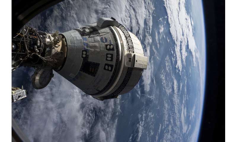 NASA decides to keep 2 astronauts in space until February, nixes return on troubled Boeing capsule