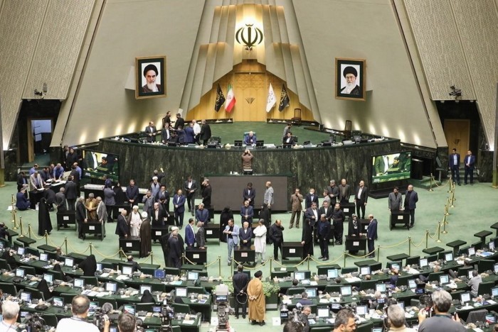 Lawmakers in Tehran count the votes for proposed appointments to the new cabinet. 