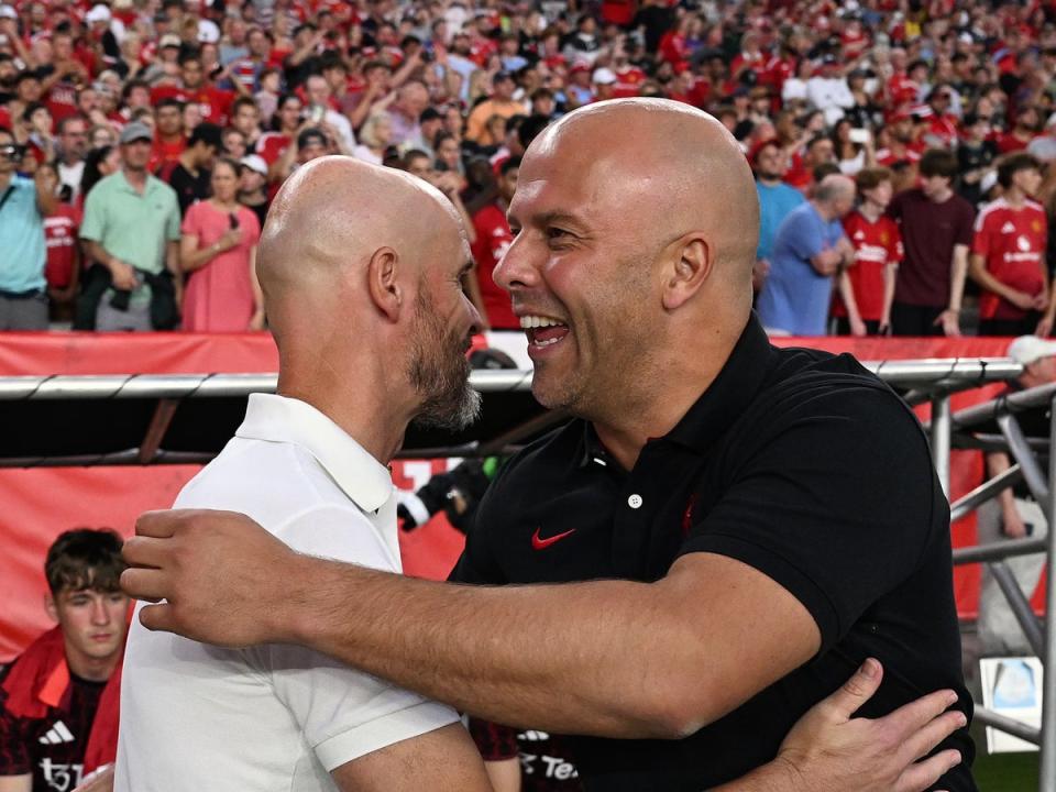 Arne Slot (right) and Erik ten Hag will renew their rivalry from the Netherlands (Liverpool FC via Getty Images)