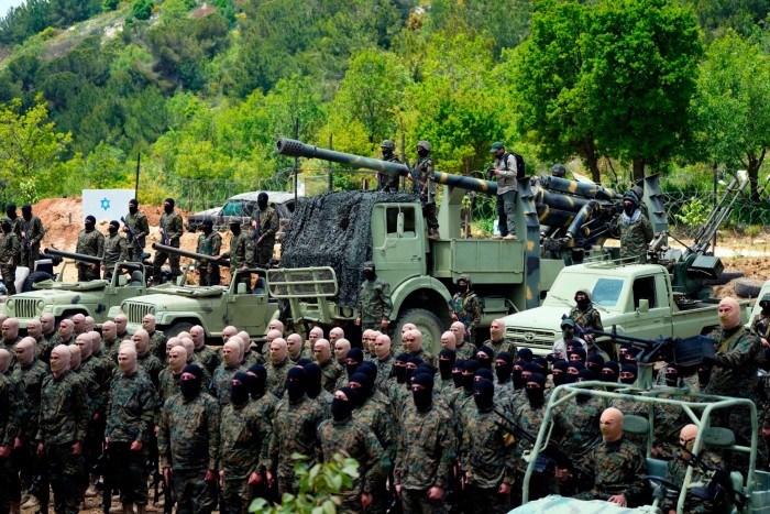 Hizbollah carry out a training exercise in Aaramta village in the Jezzine District, southern Lebanon