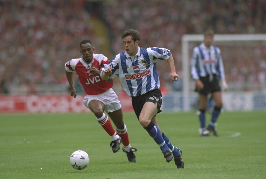 Ian Wright of Arsenal and John Harkes of Sheffield Wednesday