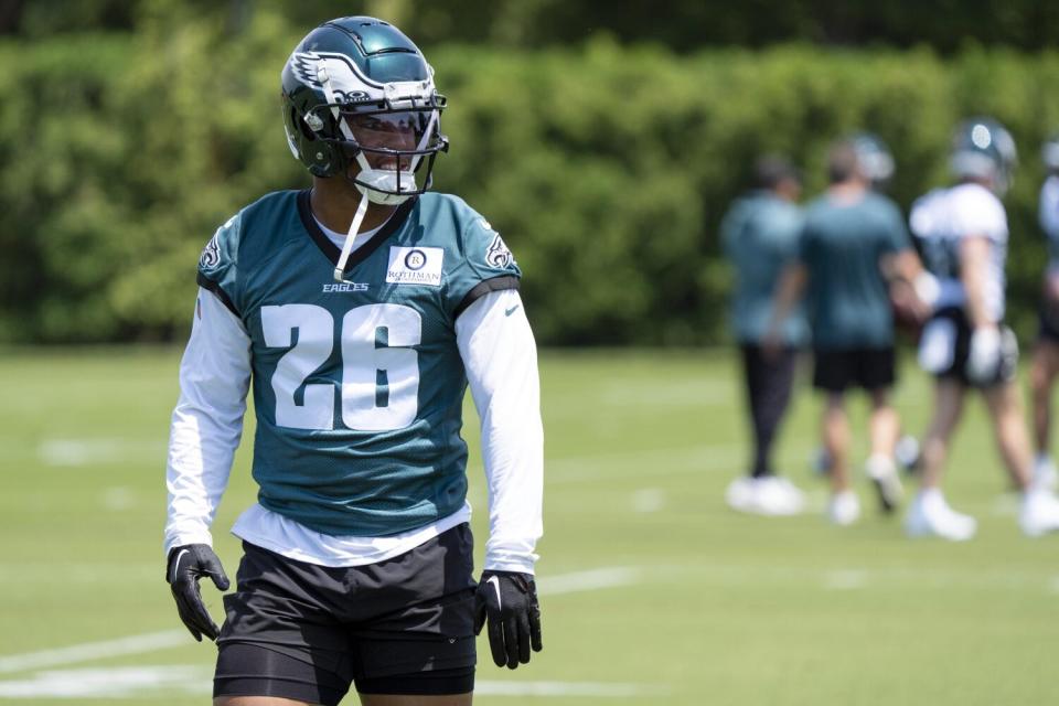 Eagles running back Saquon Barkley walks off the practice field during training camp.