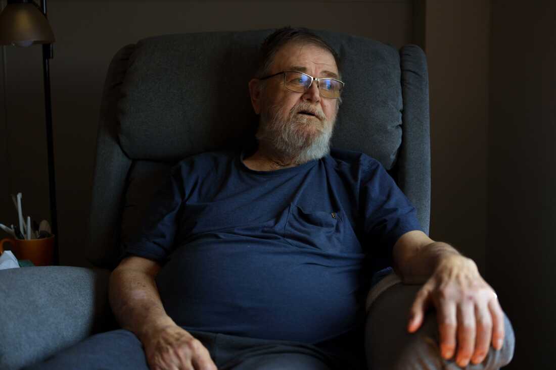 Sherwood Haakenson sits in his room at the Heart of America Medical Center long-term care facility in Rugby, N.D., on May 14. 