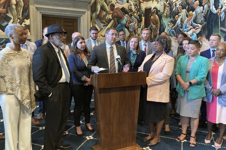 Missouri state Rep. Chris Sander, a Republican, and Missouri House Democrats speak with reporters on May 10, 2023, in the state Capitol in Jefferson City, Mo. 