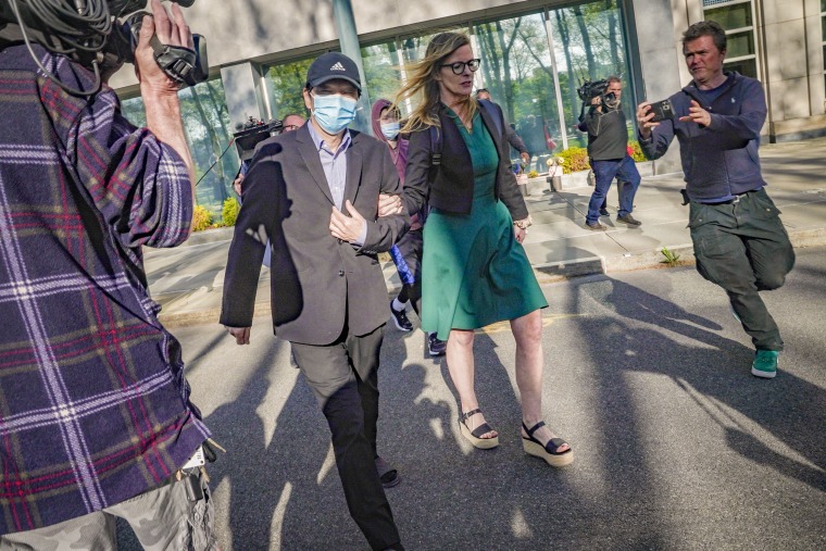 Chinese-American academic Wang Shujun speaks to the press after being convicted in Brooklyn federal court on charges of acting as an illegal agent of China's government, in New York