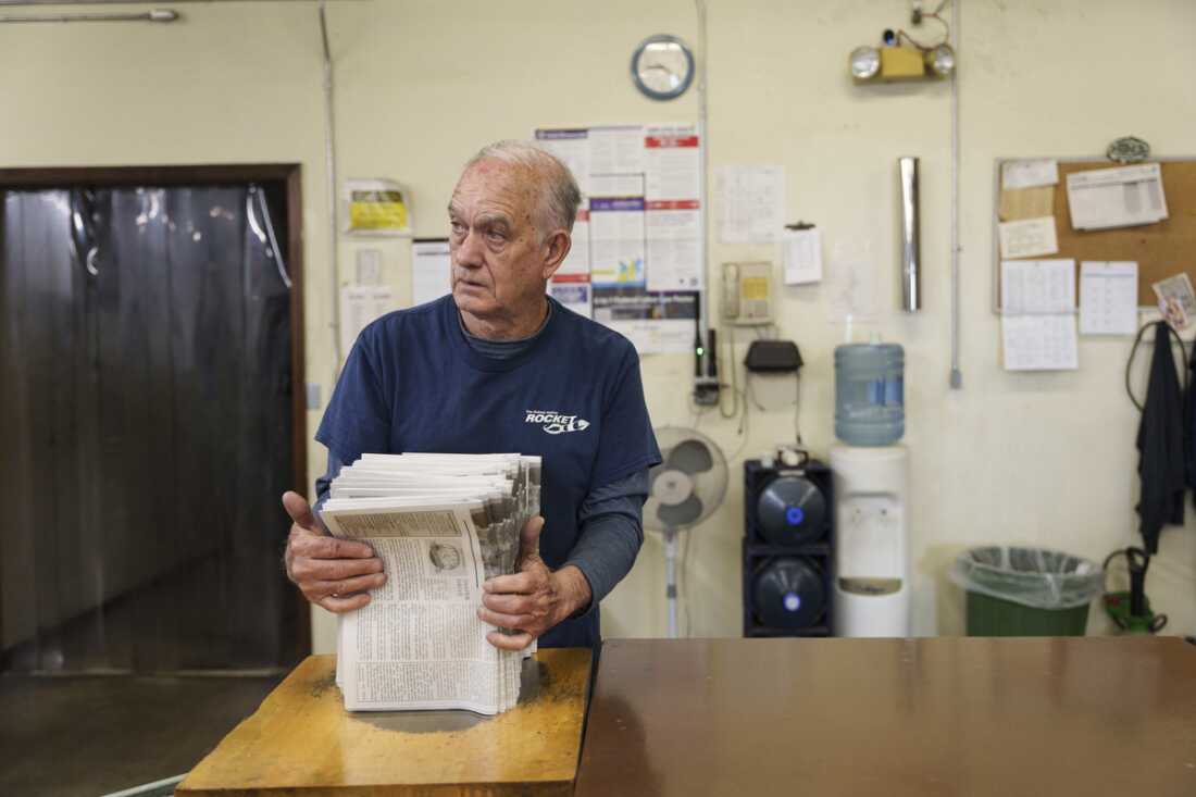 Adolfo Pino, 73, prepares a batch of local newspapers for delivery during a work shift at Rocket Printing in Armour, S.D., on May 29. Pino, a Cuban immigrant, is a participant in the Older Adult Resource Network, which connects people aged 65 and older in South Dakota’s Douglas and Charles Mix counties to resources to maintain their quality of life. Pino and his wife Neri Jorge Cruz have benefited in various ways from the program, including Spanish translation for medical appointments as well as financial assistance to help cover otherwise prohibitive health care bills.