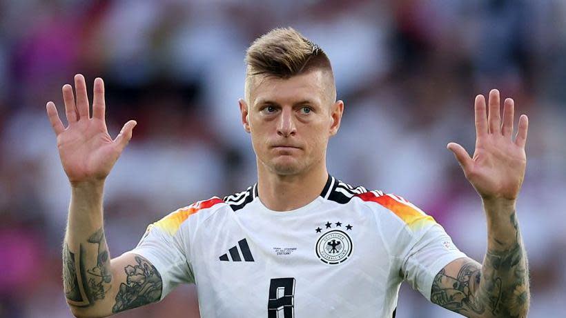 Germany's Toni Kroos waves