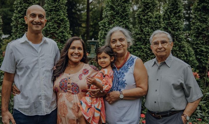 From left to right: The author's son Sachin, daughter-in-law Alka, granddaughter Ruhi, wife Bharati, and the author explore the gardens of Indianapolis Museum of Art in October 2022.