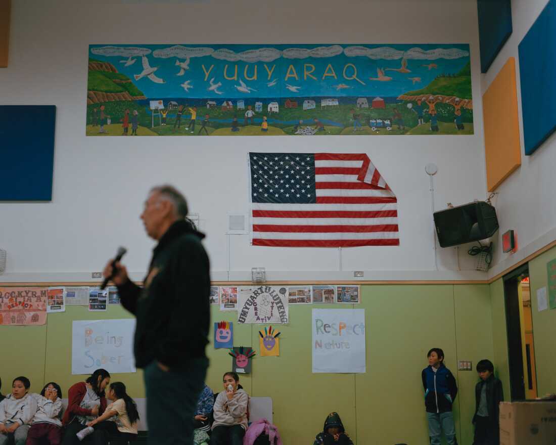 Simeon John speaks about Qungasvik with a group of students at the Lower Kuskokwim Dance Festival in Tununak, Alaska. “I don’t like to think of it as a program. A program is something that has an ending,” he explains. “I want to say Yuuyaraq [a Yup’ik way of life].”