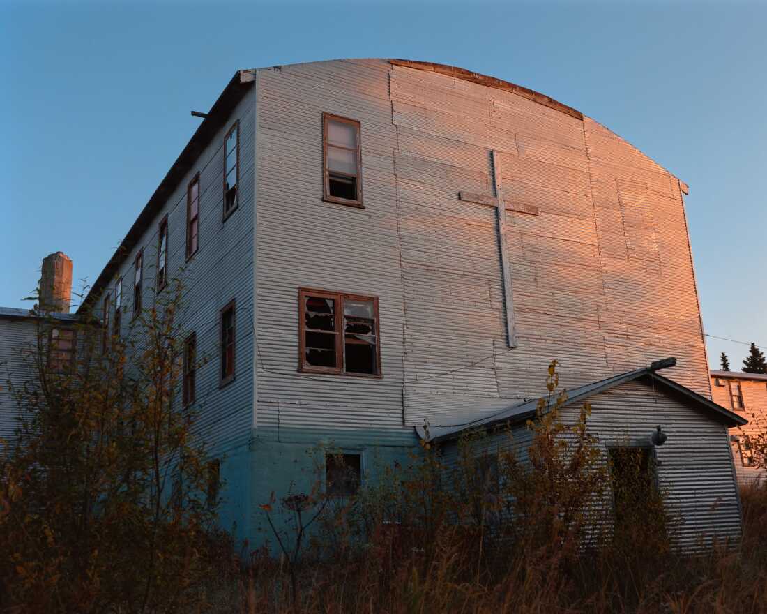 Remnants of the St. Mary's Mission Boarding School, which was built in 1894 and ceased operations in 1987 after a string of suicides. A photograph taken at the school in 1914 features a group of Native students sitting in front of a sign that reads “Do Not Speak Eskimo.