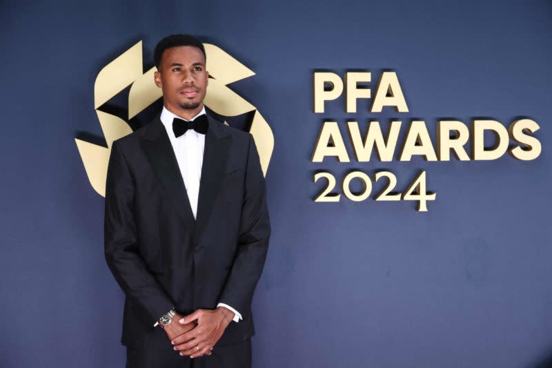 Arsenal's Brazilian defender Gabriel Magalhaes poses on the red carpet upon arrival for the 2023-2024 Professional Footballers' Association (PFA) awards, at the Opera House, in Manchester, northern England, on August 20, 2024. (Photo by DARREN STAPLES/AFP via Getty Images)