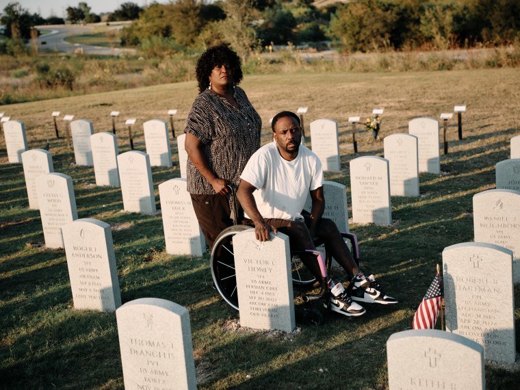 Kimberly Patman and her son Victor Honey at the grave of Victor C. Honey