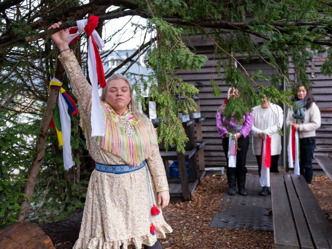 Anne Merete Gaup, a Sámi woman from Norway, prepares for the ceremony.