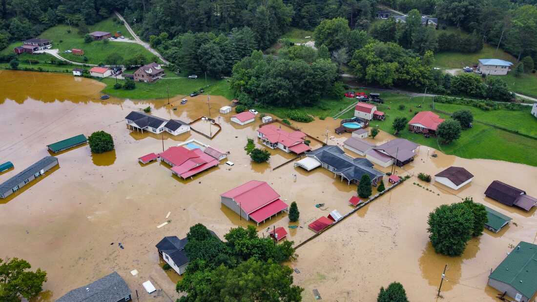 Aerial view of homes submerged under flood waters from the North Fork of the Kentucky River in Jackson, Kentucky, on July 28, 2022. 