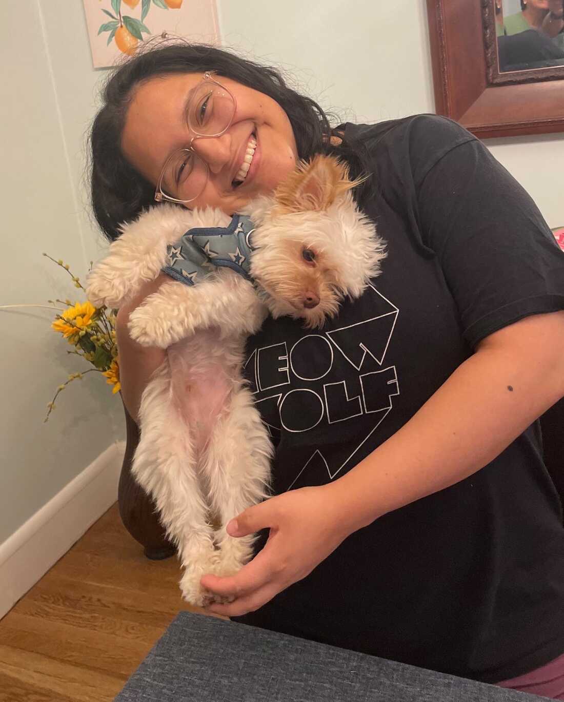 Lourdes Monje with their dog, Tofu