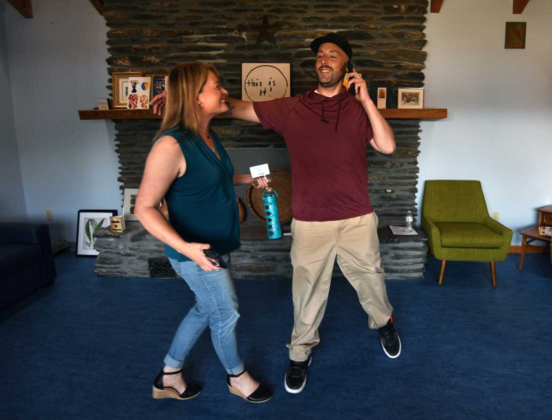 Eric Breeyear, 41 years old, has been in recovery from opioid addiction for roughly a year.  He embraces executive director Julie Bond who runs the Good Samaritan Haven, a shelter that offers addiction programs in Barre and Berlin, Vermont.