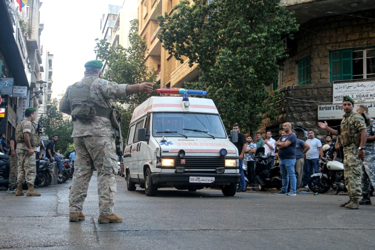 Soldiers secure the area outside the American University hospital