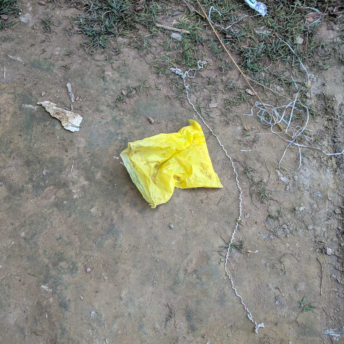 A discarded plastic bag that was filled with lead chromate at a polishing mill in Bangladesh. Polishing makes the root look better -- and can involve using lead chromate to amp up the yellow hue that customers like.