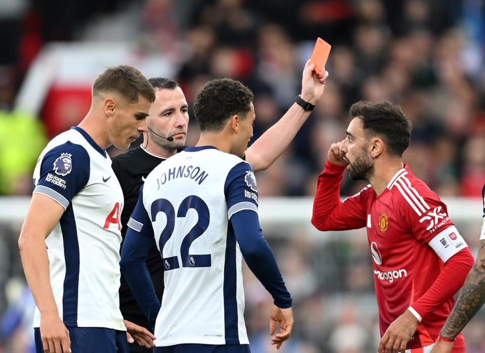 Bruno Fernandes of Manchester United receives a red card from referee Chris Kavanagh (Getty Images)