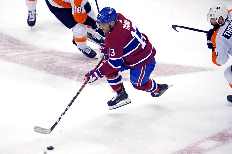 Aug 18, 2020; Toronto, Ontario, CAN; Montreal Canadiens center Max Domi (13) moves the puck against Philadelphia Flyers center Nate Thompson (44) during the first period in game four of the first round of the 2010 Stanley Cup Playoffs at Scotiabank Arena. Mandatory Credit: John E. Sokolowski-Imagn Images