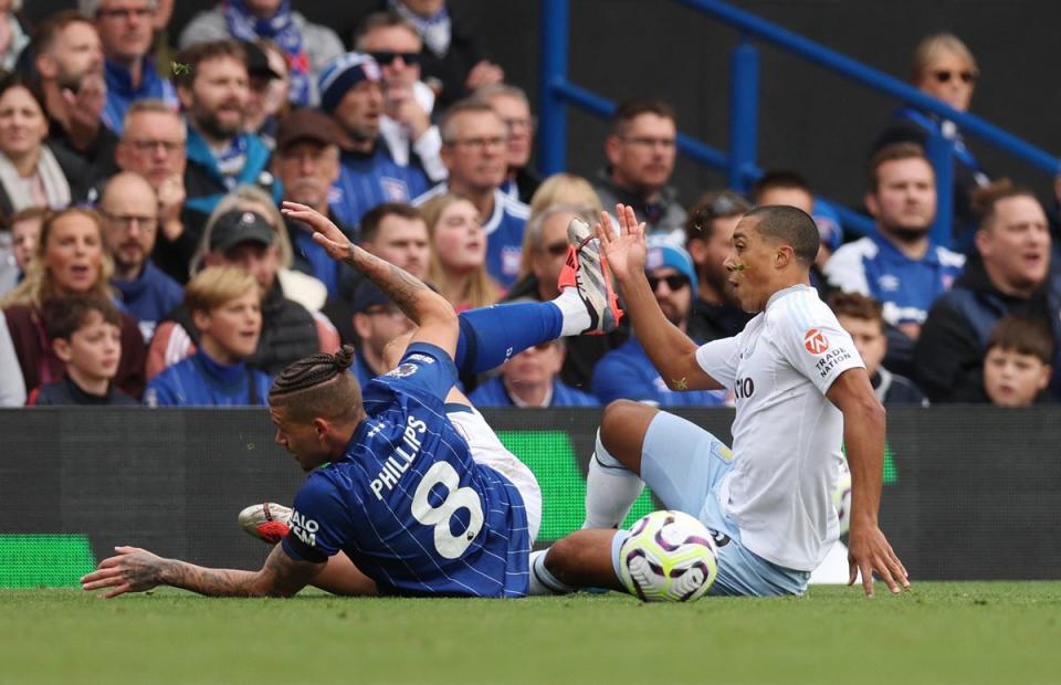 Youri Tielemans in action with Ipswich Town’s Kalvin Phillips (REUTERS)