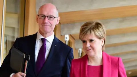 Getty Images John Swinney and Nicola Sturgeon