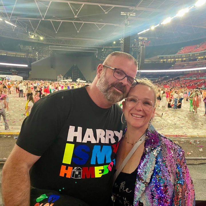 The author and her husband attend a Harry Styles concert at Wembley Stadium in England.