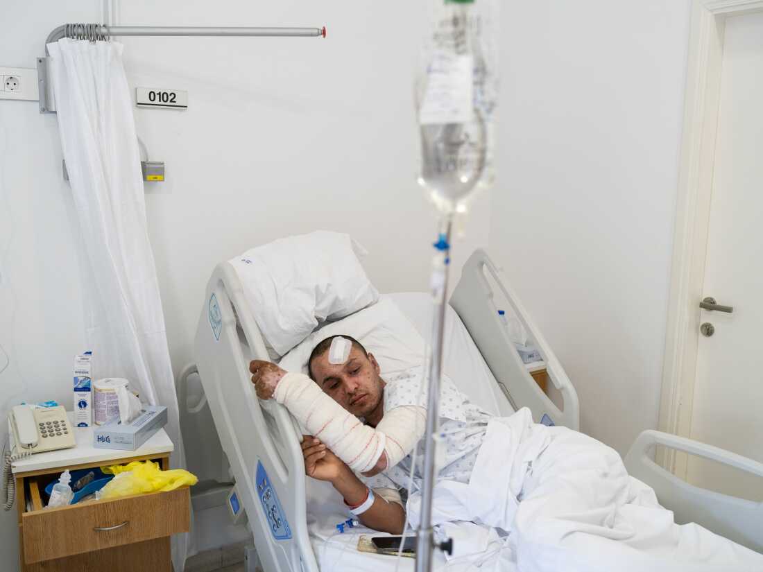 Mahmoud Dhaiwi, 23, a Lebanese army soldier who got injured during an Israeli airstrike in southern Lebanon, is hospitalized at Geitaoui Hospital's burn unit, in Beirut, Oct. 11.