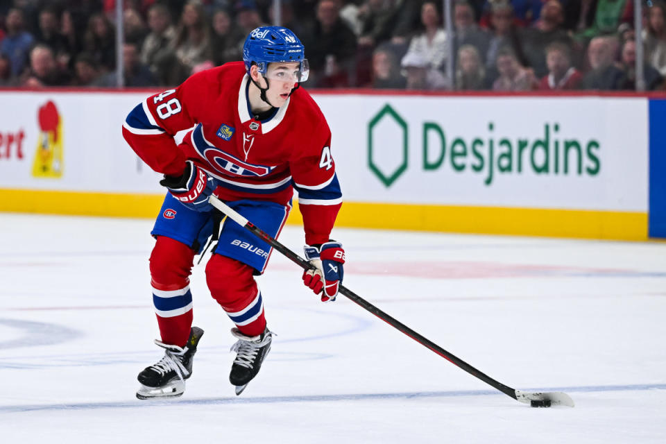 Oct 12, 2024; Montreal, Quebec, CAN; Montreal Canadiens defenseman Lane Hutson (48) plays the puck against the Ottawa Senators during the third period at Bell Centre. Mandatory Credit: David Kirouac-Imagn Images