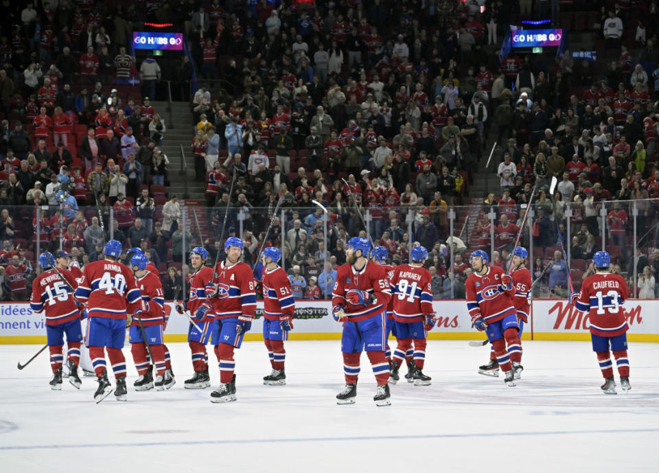 Oct 26, 2024; Montreal, Quebec, CAN; The Montreal Canadiens celebrate after defeating the St.Louis Blues at the Bell Centre. Mandatory Credit: Eric Bolte-Imagn Images