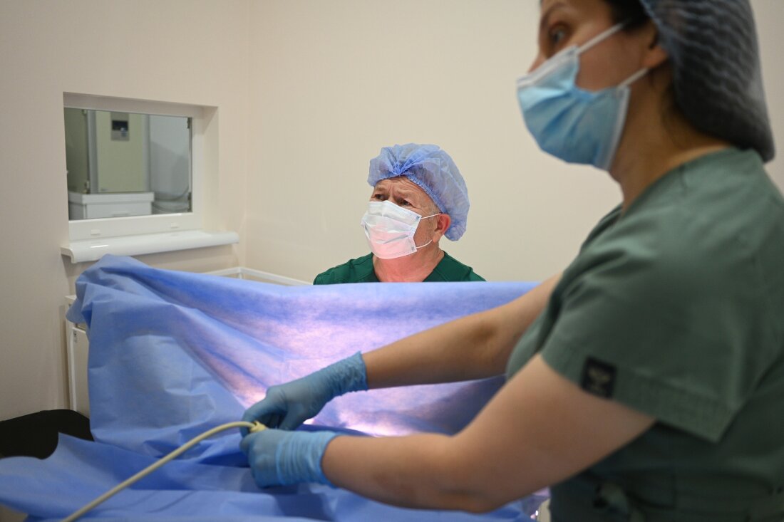 Dr. Stefan Khmil performs artificial insemination on a patient in his Clinic of Prof. Stefan Khmil in Ternopil, Ukraine, on July 12.