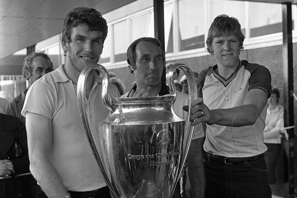 Tony Barton (centre) poses with the European Cup alongside Peter Withe (left) and goalkeeper Nigel Spinks (PA)