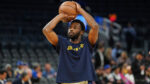 Healthy Wiggins practices with Warriors; his preseason status remains undecided