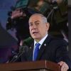 Israeli Prime Minister Benjamin Netanyahu delivers a speech at the Mount Herzl military cemetery in Jerusalem on Oct. 27.