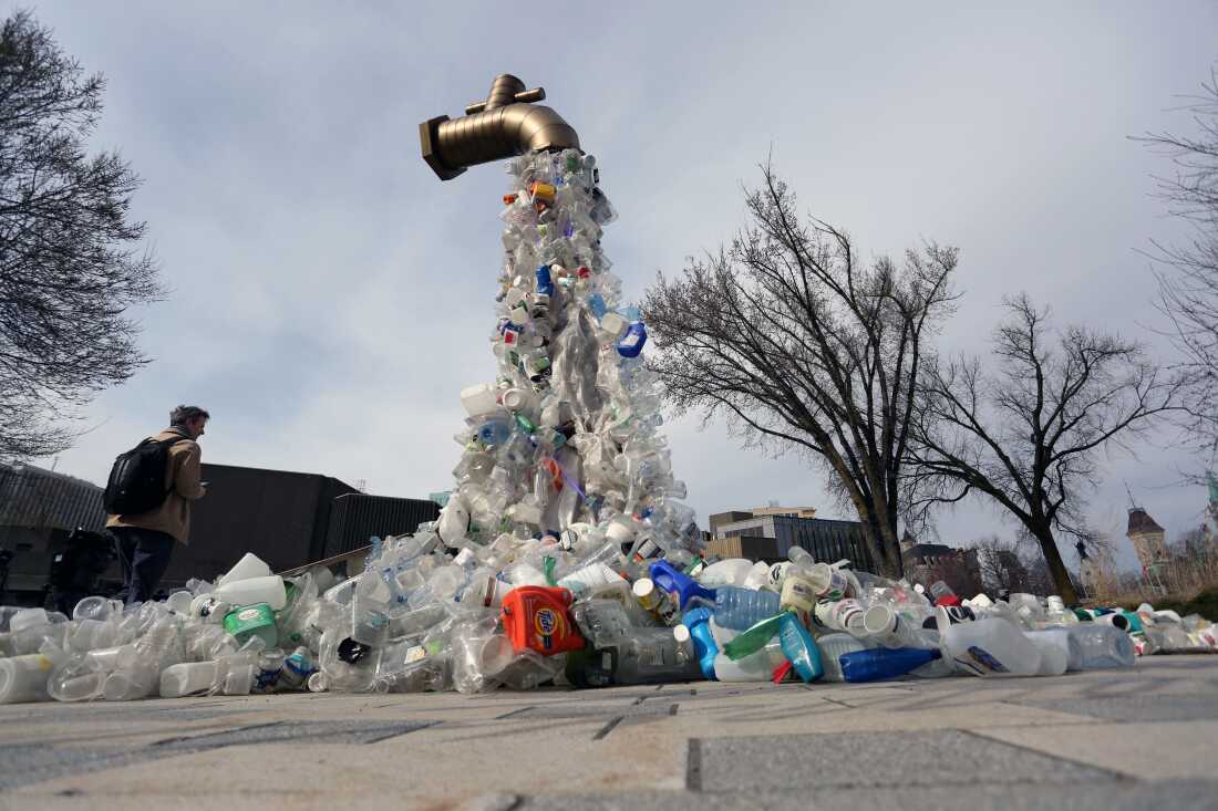 A sculpture titled "Giant Plastic Tap" by Canadian artist Benjamin Von Wong is displayed outside the fourth session of the U.N. Intergovernmental Negotiating Committee on Plastic Pollution in Ottawa, Canada, in April.