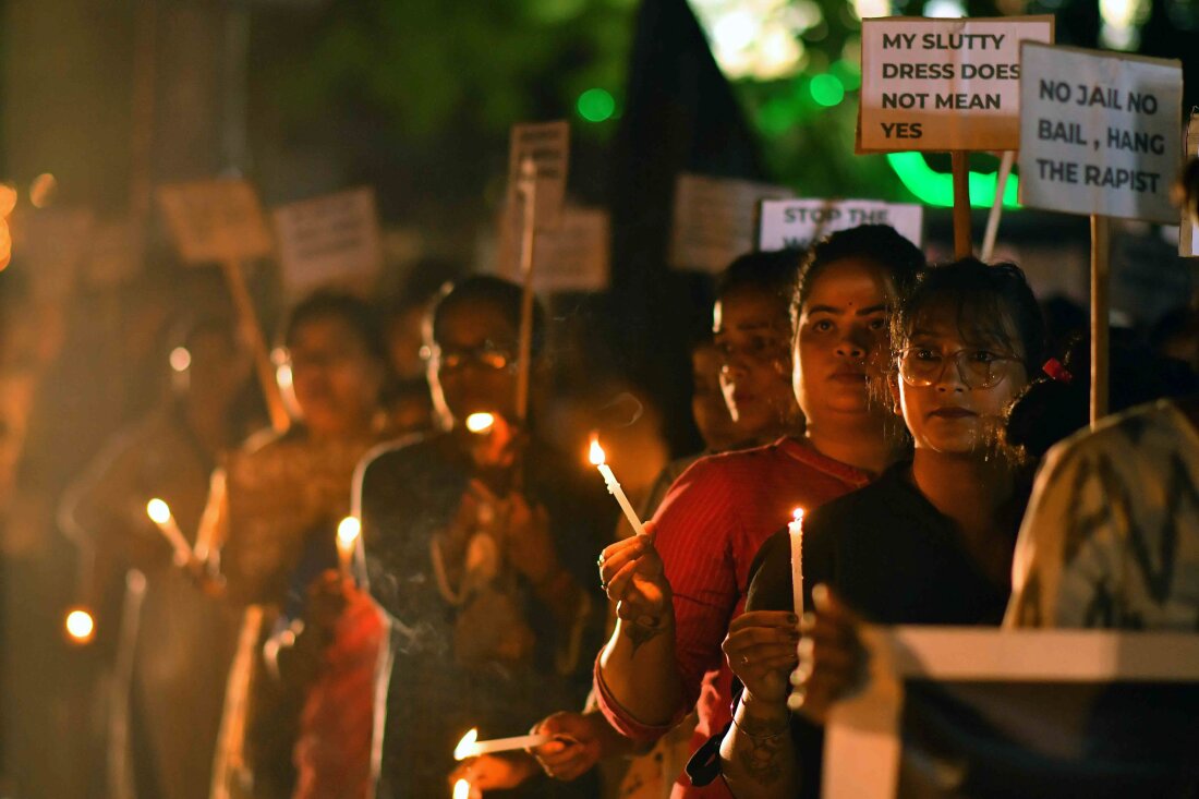 Women stage a silent protest against the rape and killing of a trainee doctor at a government hospital in Nagaon District of Assam, India, on August 24, 2024.