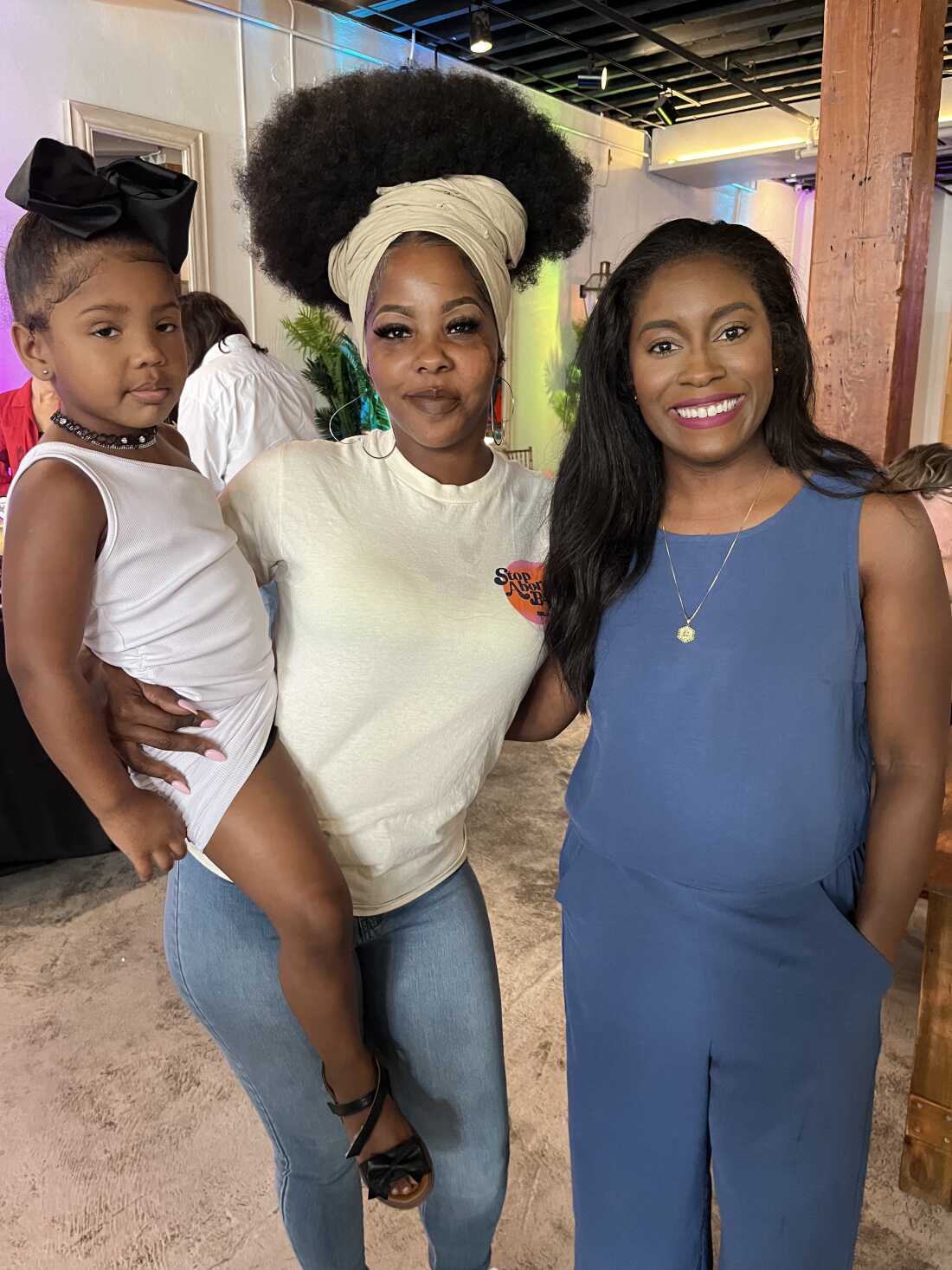 Nancy Davis (left) with her daughter Summer, and Kaitlyn Johsua during a Free & Just event for reproductive freedom in New Orleans, LA, on Oct. 14, 2024.