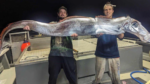 Picture Shows Two Men Holding ‘Doomsday Fish’?